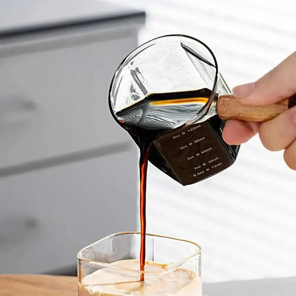 Heat-Resistant Glass Measuring Cup with Wooden Handle for Easy Pouring - Clarify.pk