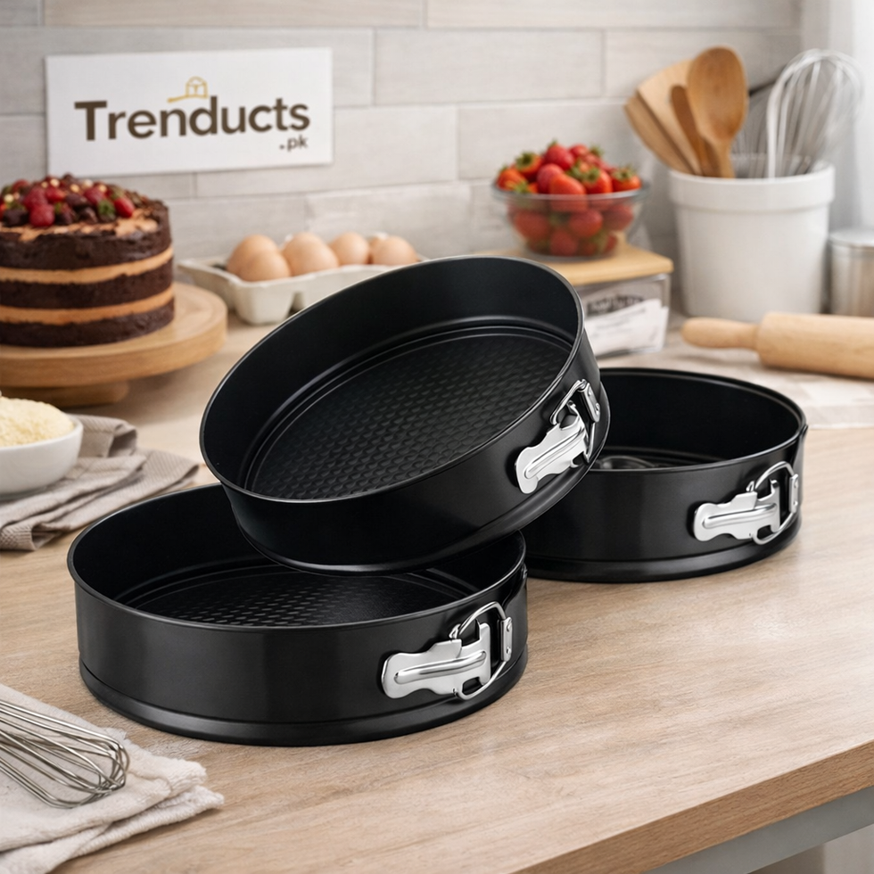 Three black non-stick springform cake pans in various sizes with tiered cakes on display - Trenducts Pakistan
