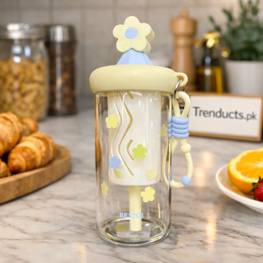 "Aesthetic glass sipper cup with handle and reusable straw for iced coffee."

"Transparent 450ml glass tumbler for healthy juices and tea in Pakistan."