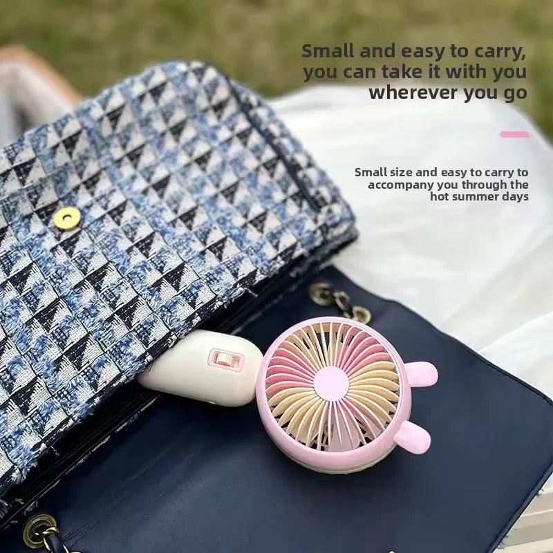 Mini Handheld Fan – Portable USB Rechargeable 3-Speed Cooling - Clarify.pk