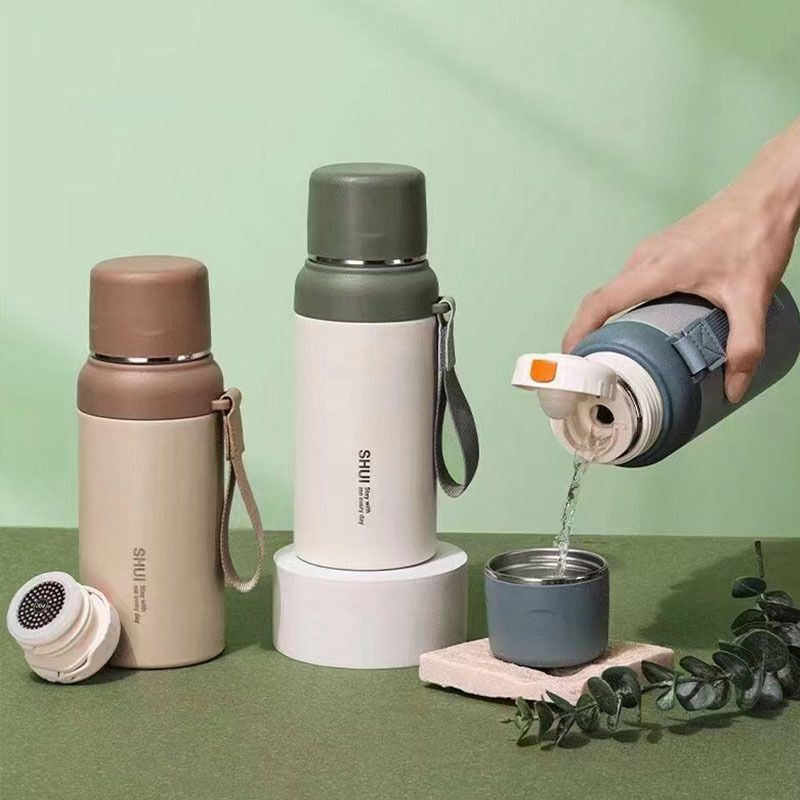 Premium PureSip Vacuum Thermo Bottle - 600ml Insulated (Random Color) - Trenducts.pk