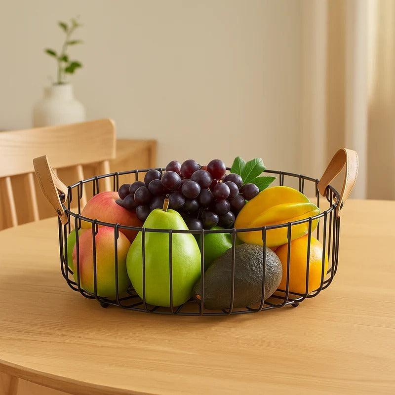 Binca 30cm black round wire fruit basket with tan leather handles filled with fresh grapes and pears - Trenducts Pakistan