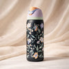 Owala FreeSip 32oz water bottle in Midnight Garden floral print with open lid showing built-in straw - Trenducts Pakistan